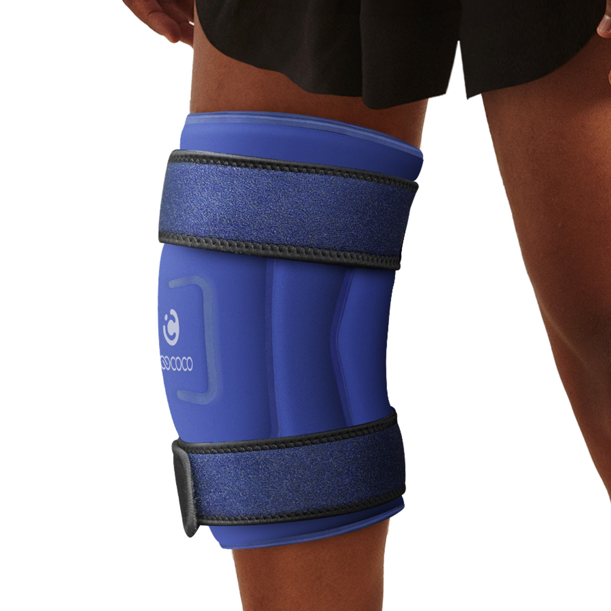 A person wearing a CooCoCo XXXL Knee Ice Pack Wrap, a reusable gel cold compress designed for knee pain and sports injuries, over their leg while dressed in dark shorts.